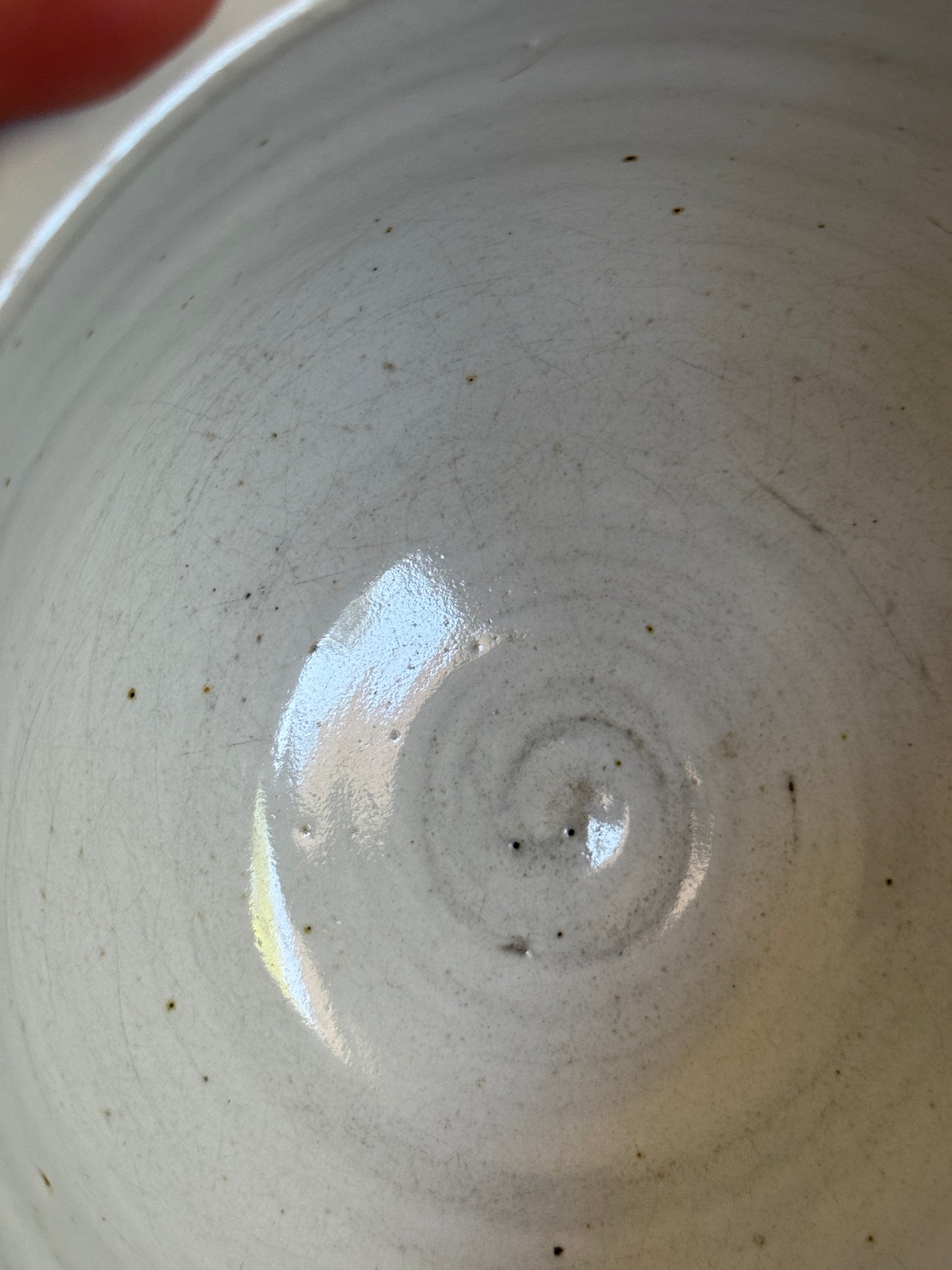 Brown and White Pottery Bowl with Pour Spout