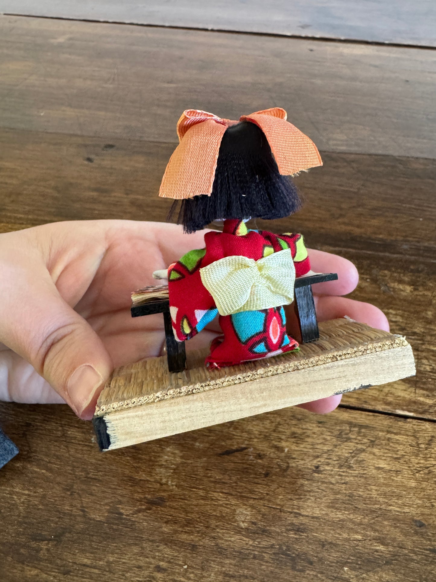 Vintage Japanese Mixed Media Kokeshi Doll on Mat in Learning Environment