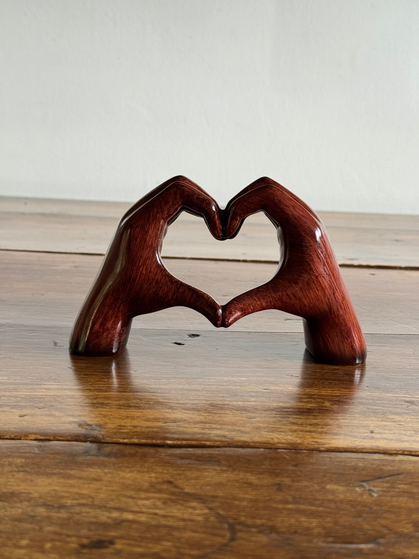 Ceramic Hands Making Heart Shape Figurine