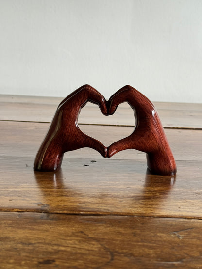 Ceramic Hands Making Heart Shape Figurine
