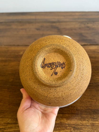 Brown and White Pottery Bowl with Pour Spout