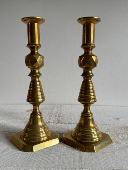 Vintage Pair of Brass Candlestick Holders with Push Up Base Design