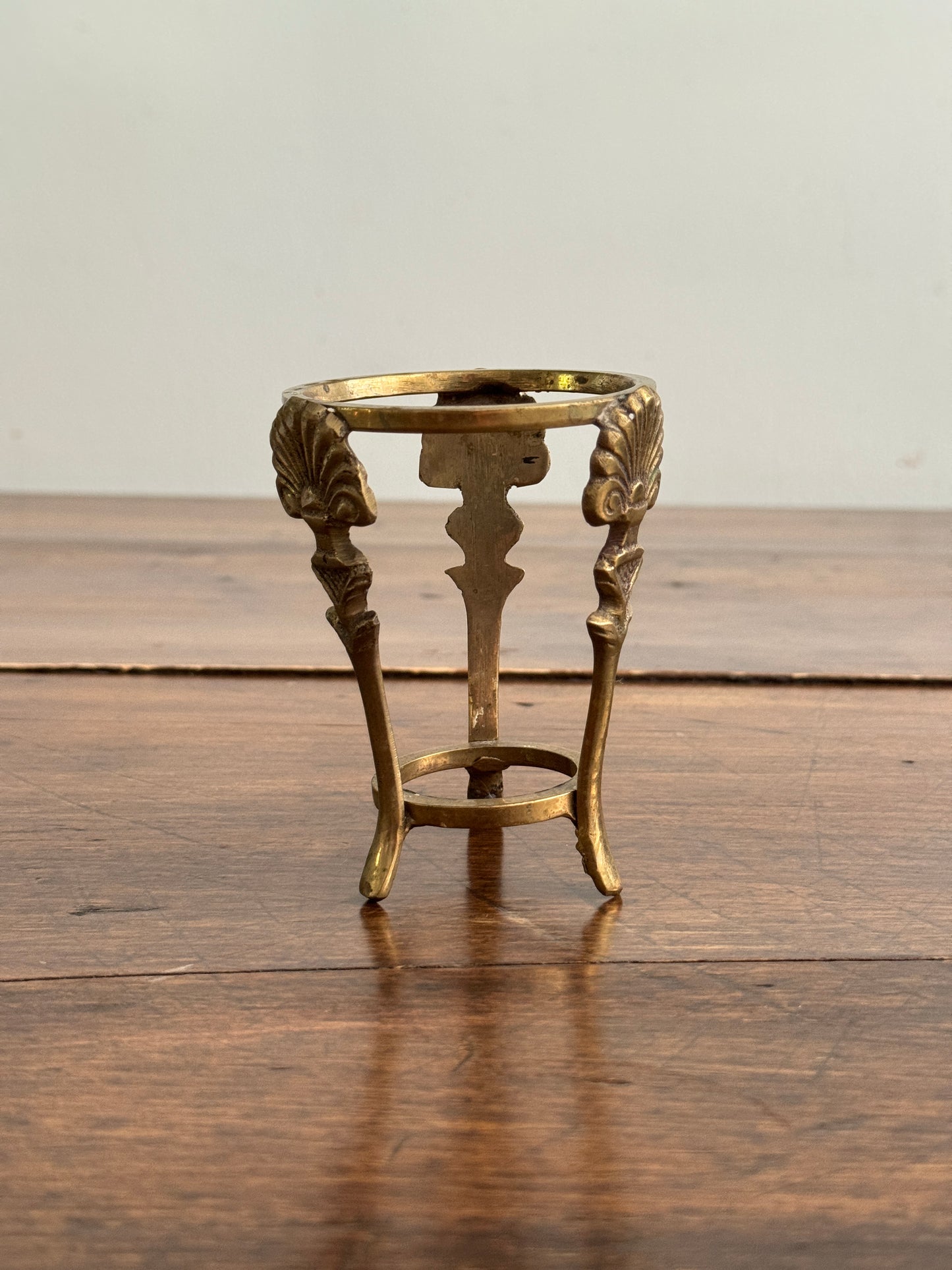 Small Brass Stand with Three Legs and Ornate Detailing