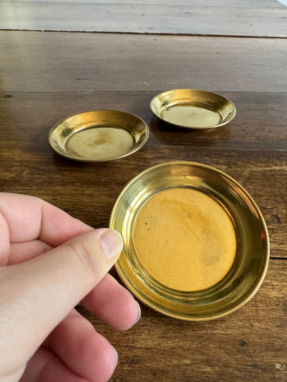 Three Small Brass Dishes with Simple Rolled Edge Design
