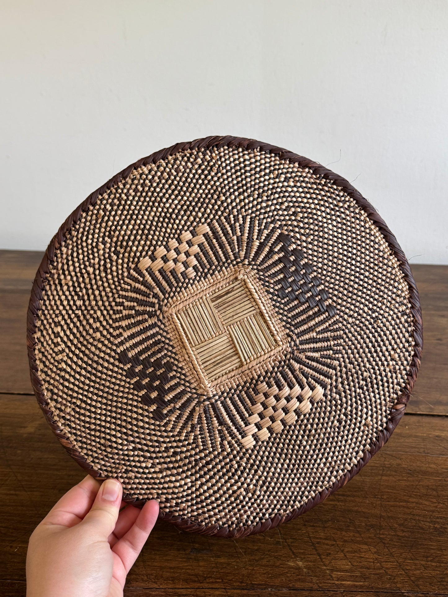 Vintage Woven African Flat Style Basket with Detailed Weaving Design