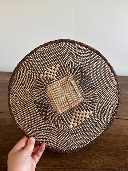 Vintage Woven African Flat Style Basket with Detailed Weaving Design