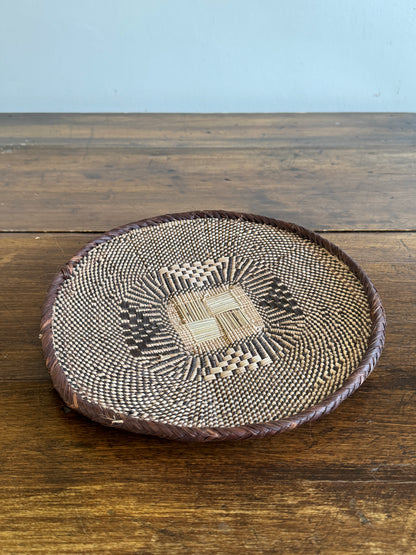 Vintage Woven African Flat Style Basket with Detailed Weaving Design