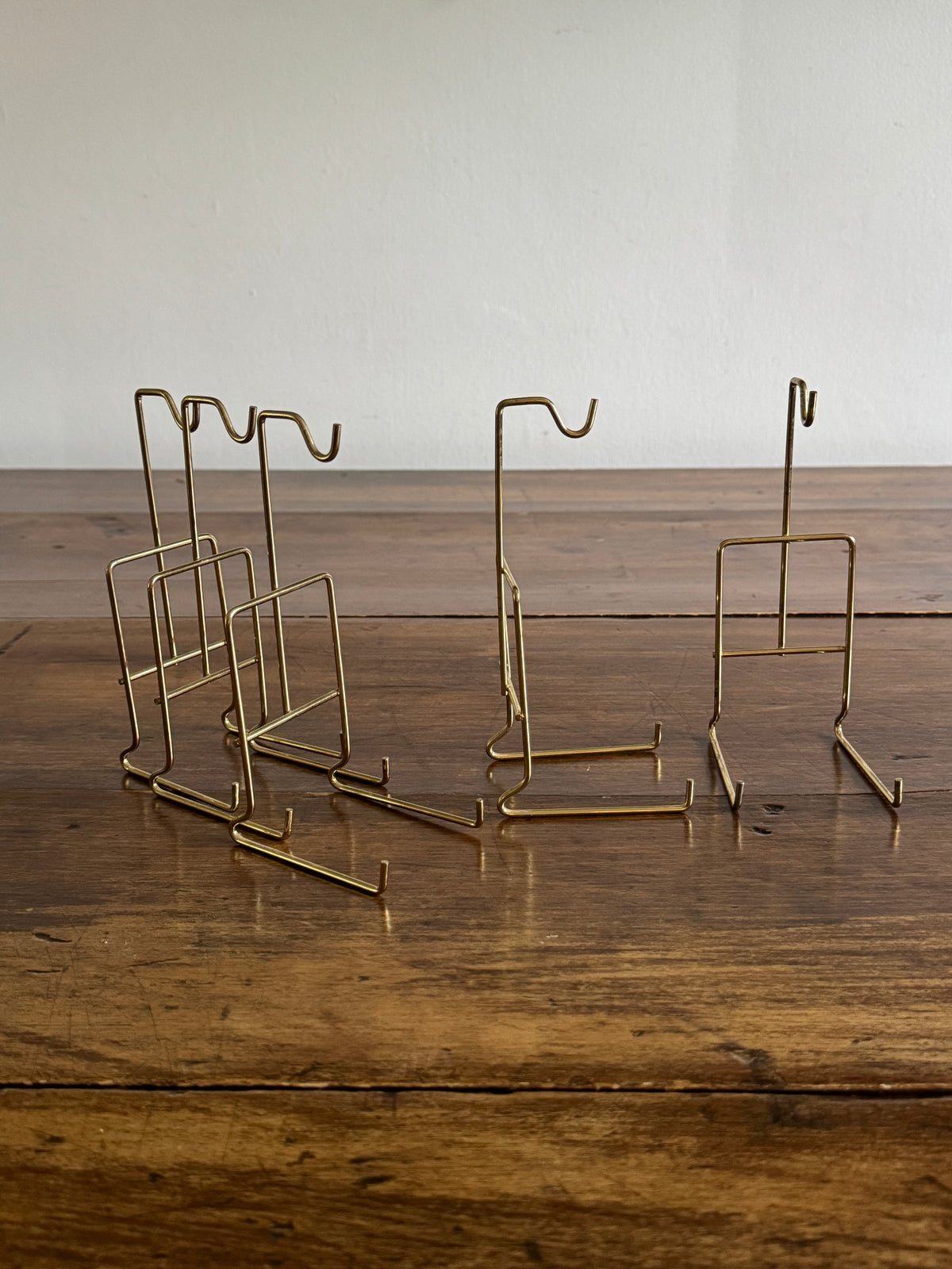 Five Cup and Saucer Display Stands - Gold-Toned Metal Teacup and Saucer Display Stands
