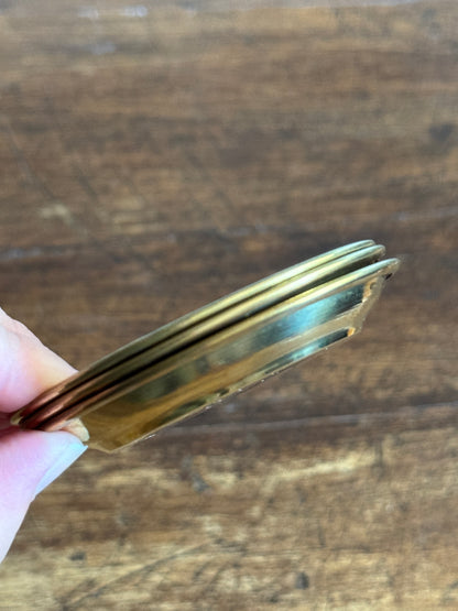 Three Small Brass Dishes with Simple Rolled Edge Design