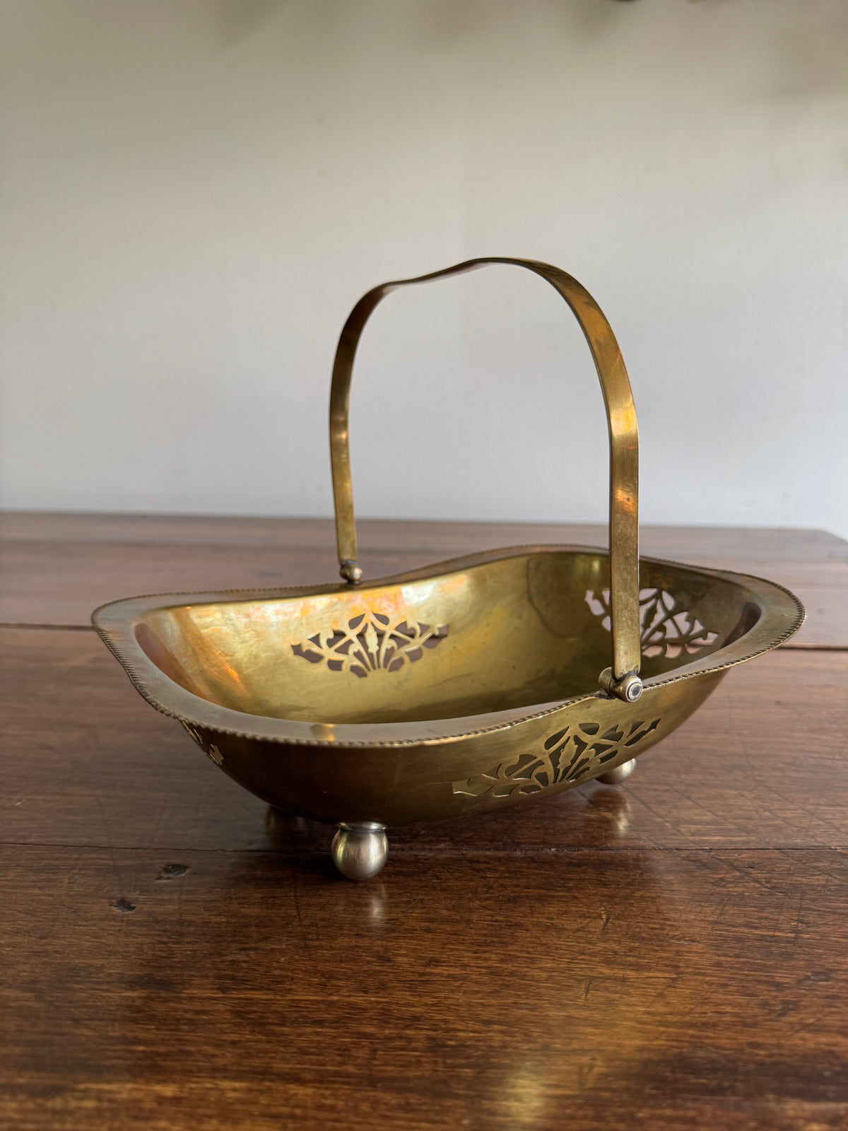 Vintage Cutout Brass Bowl with Handle and Small Ball Feet
