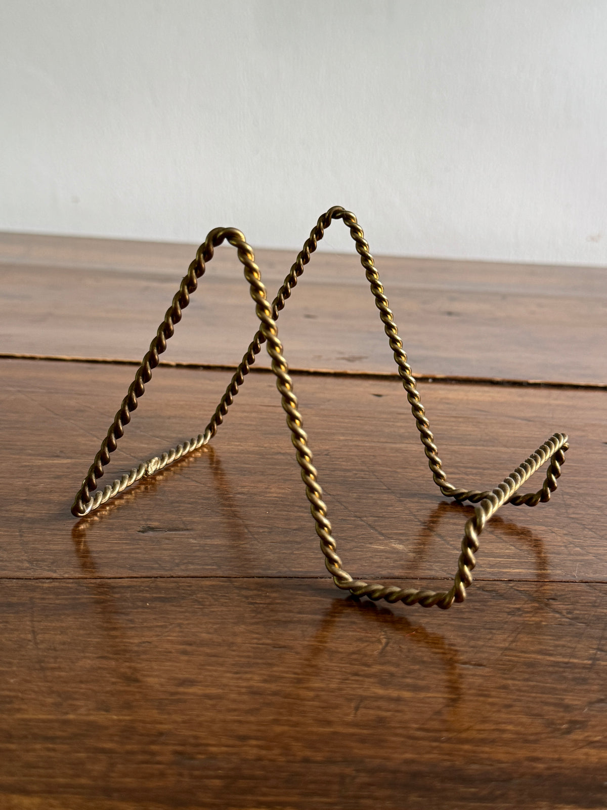 Set of Four Twisted Rope Brass Display Stands