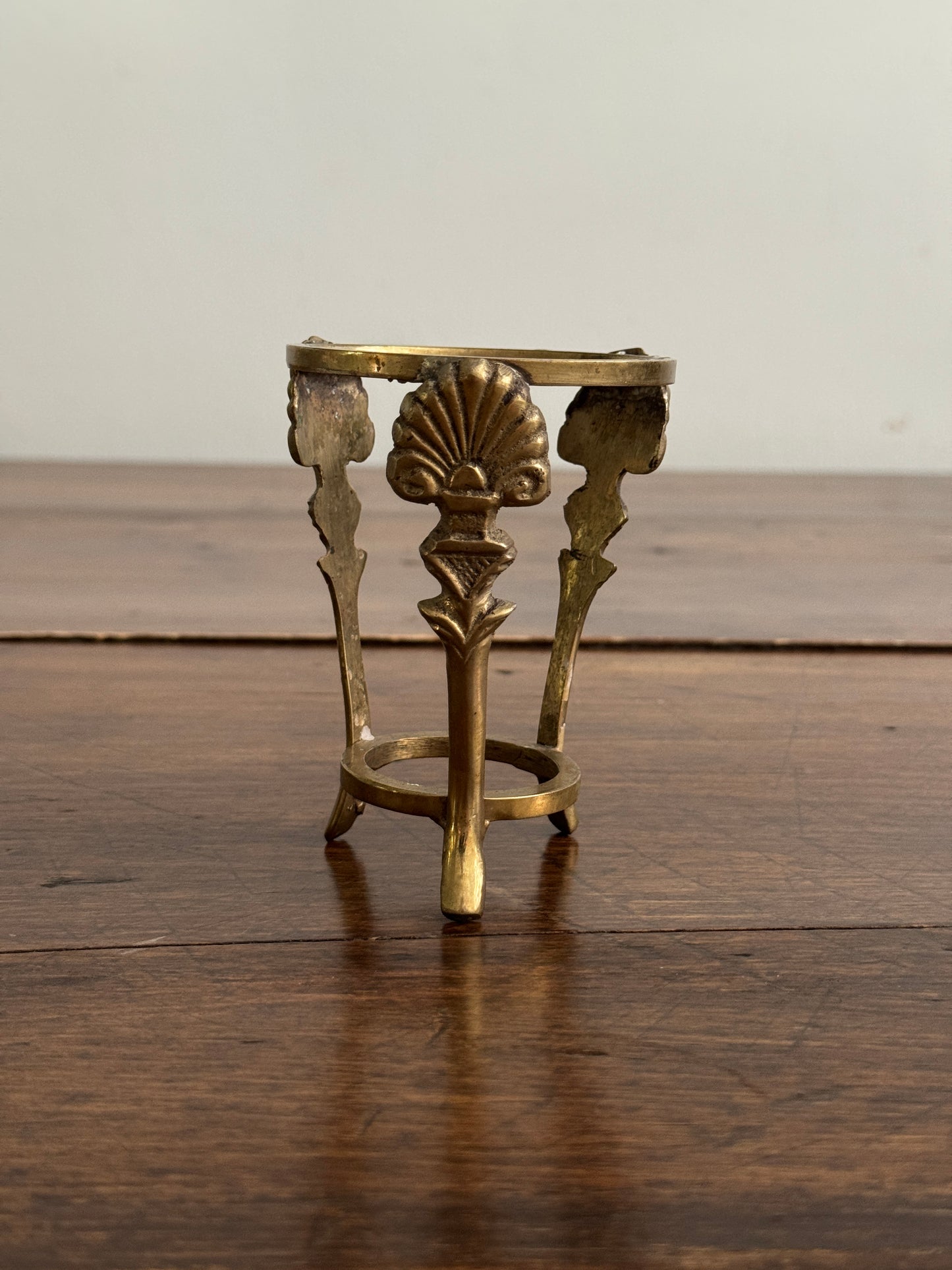 Small Brass Stand with Three Legs and Ornate Detailing