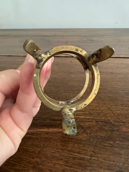 Small Brass Stand with Three Legs and Ornate Detailing