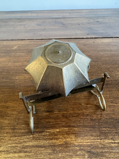 Vintage Brass Frogs Sitting on Bench Under Umbrella