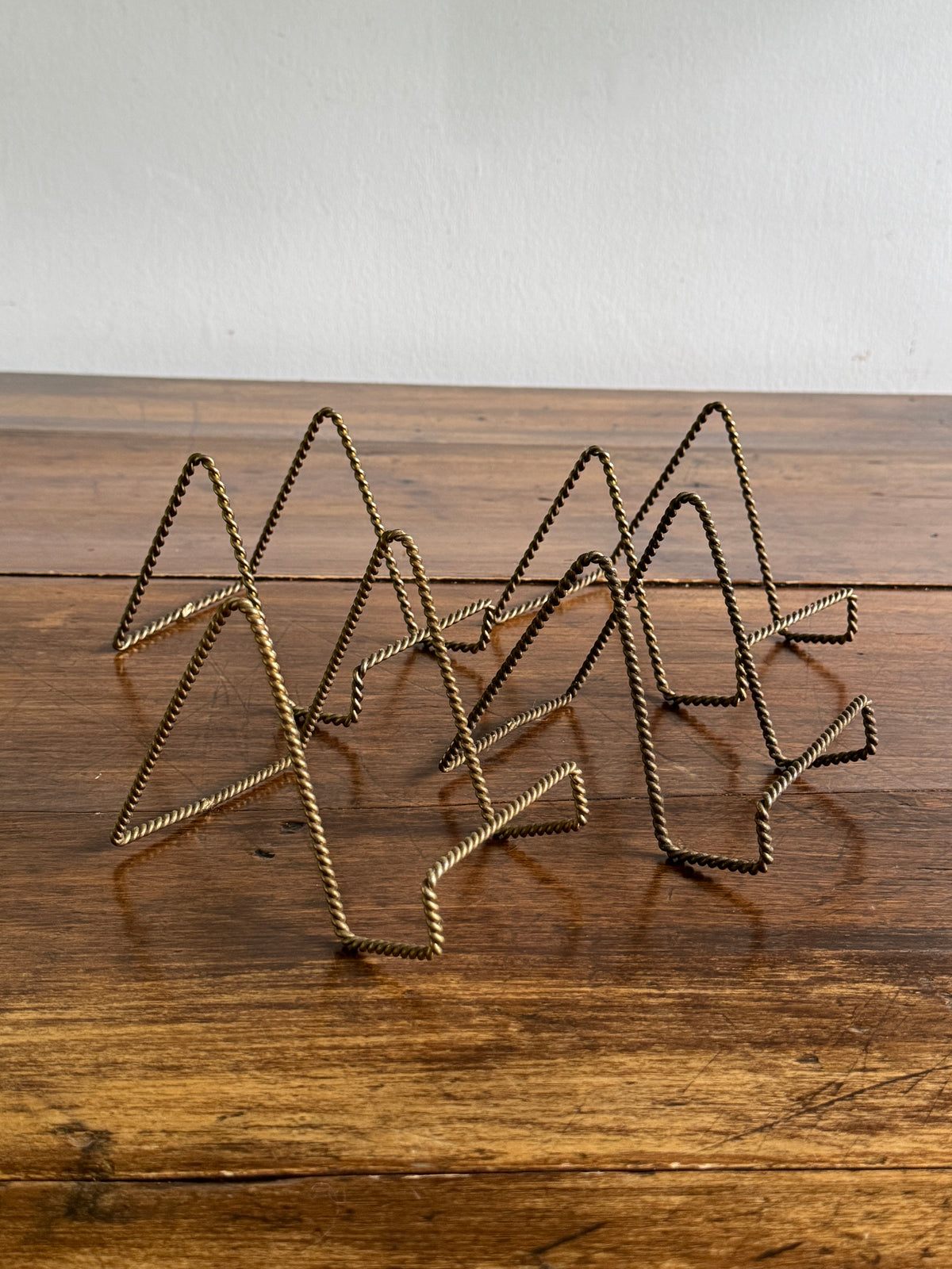 Set of Four Twisted Rope Brass Display Stands