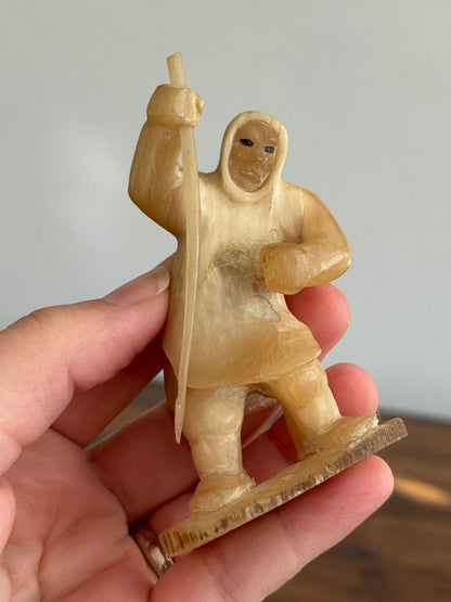 Vintage Canadian Horn Carved Seal Hunter Figurine