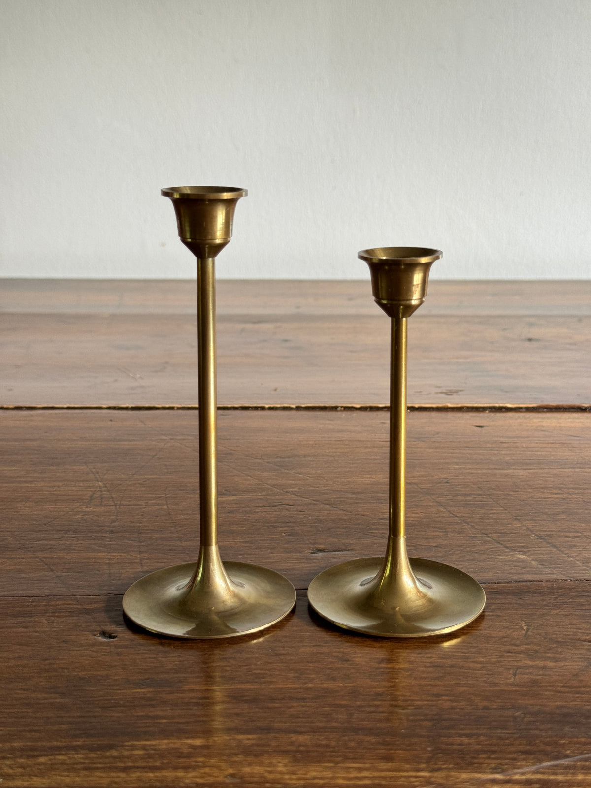 Pair of Two Brass Candles with Skinny Posts and Fluted Bottoms