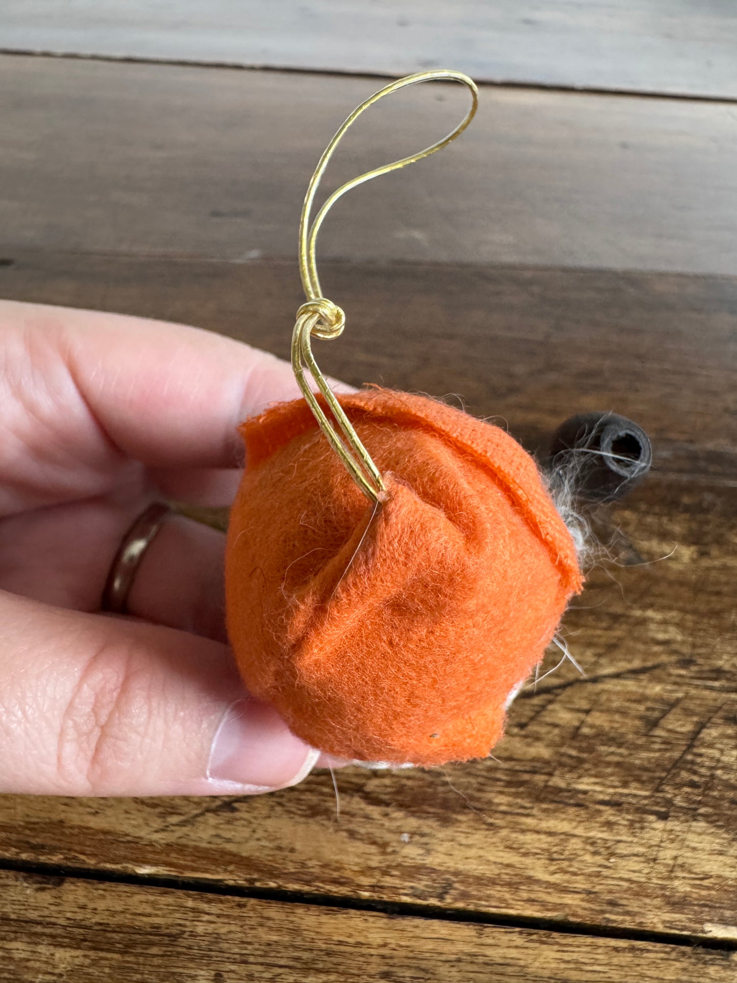 Orange Hooded B.C. Canada Mini Wood Figurine