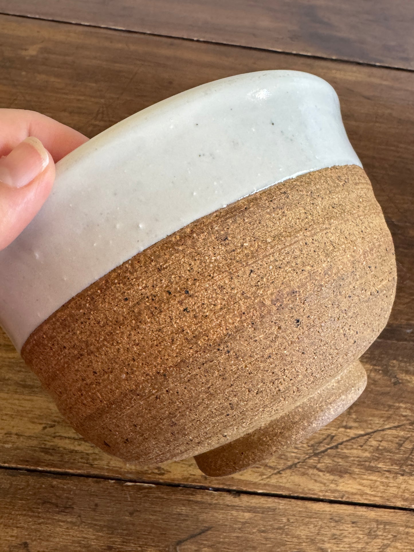 Brown and White Pottery Bowl with Pour Spout