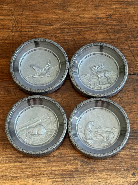 Set of Four Plastic Canadian Animal Coasters with 3D Center Art