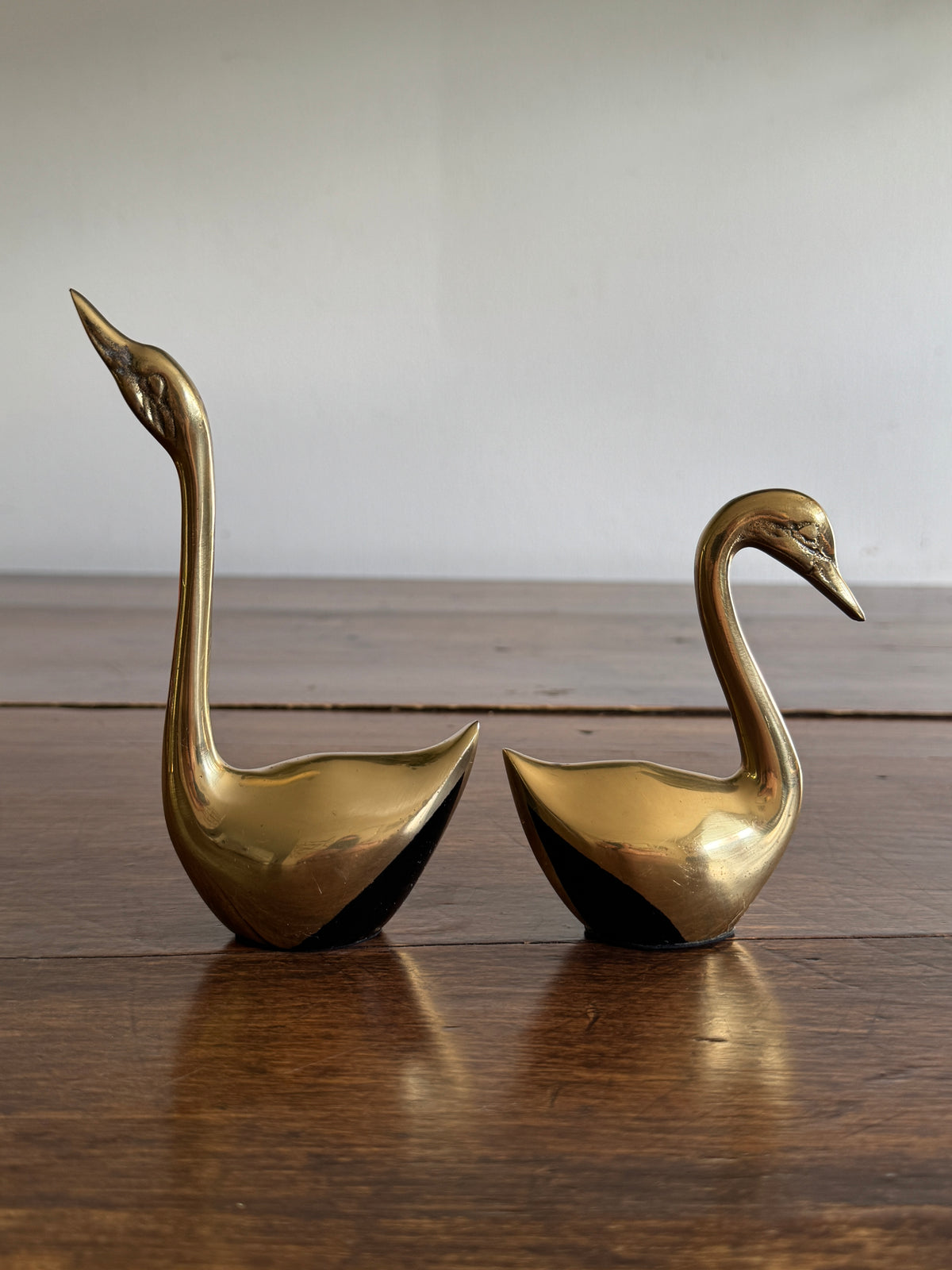 Set of Two Brass Swans with Black Base Detailing - Pair of Brass Birds