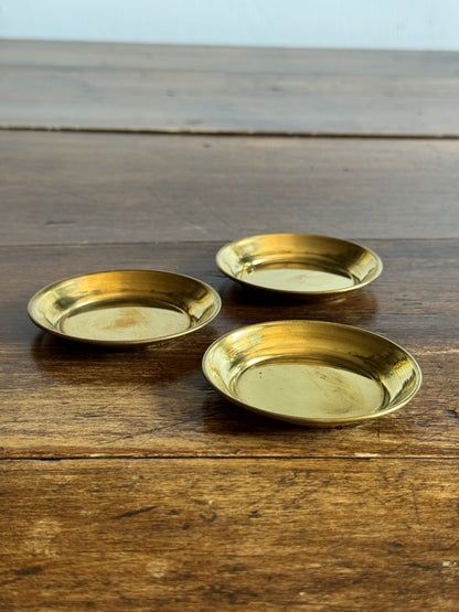 Three Small Brass Dishes with Simple Rolled Edge Design