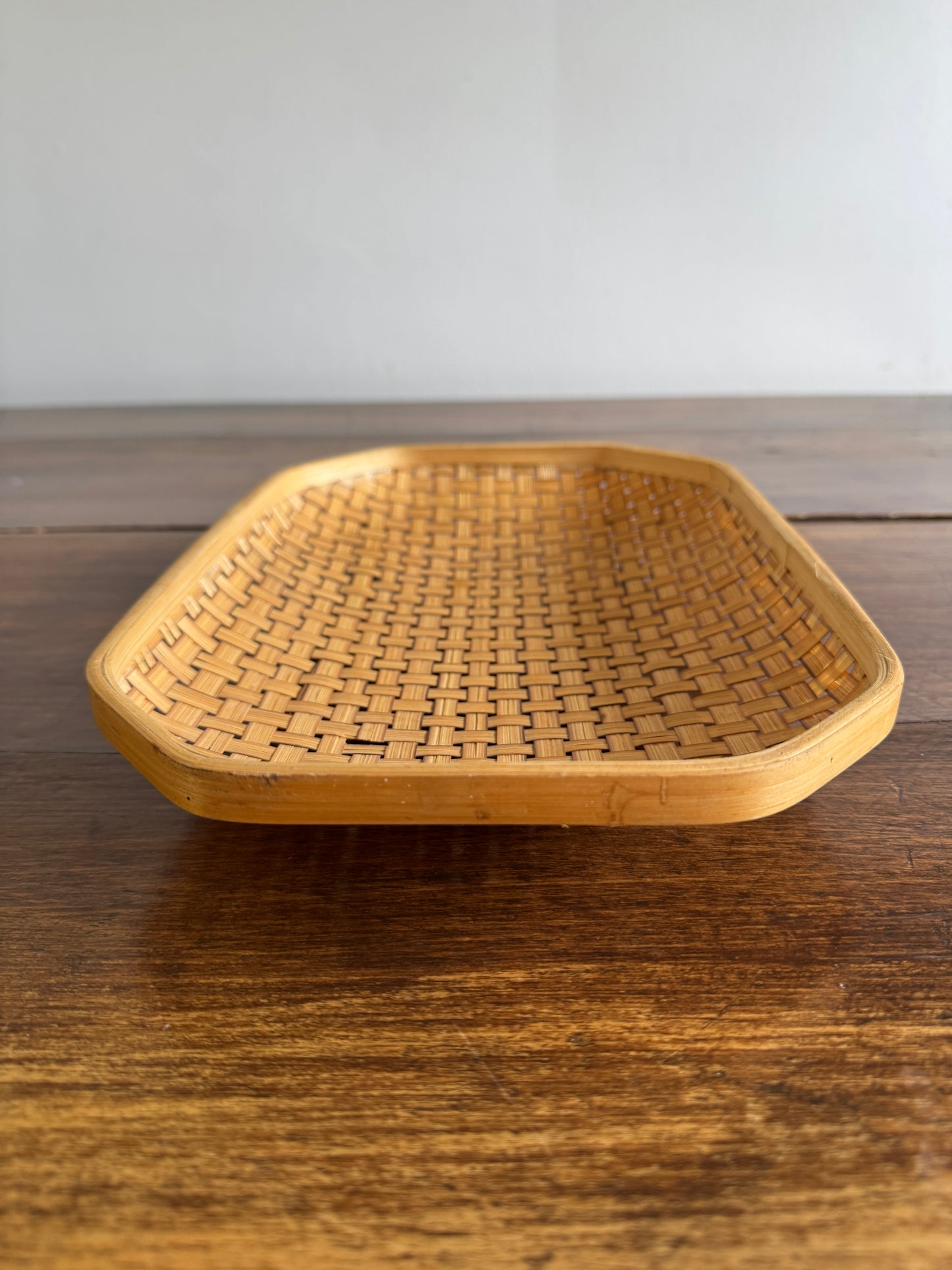 Woven Wicker Basket with Clipped Corners and Small Raised Feet