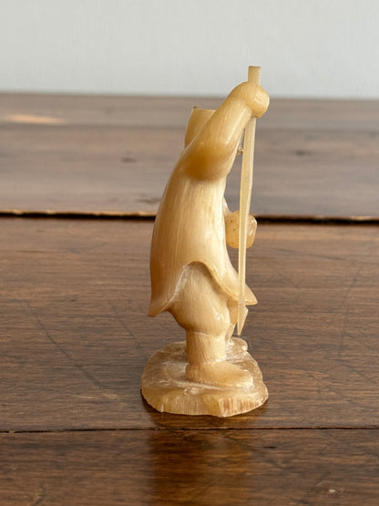 Vintage Canadian Horn Carved Seal Hunter Figurine