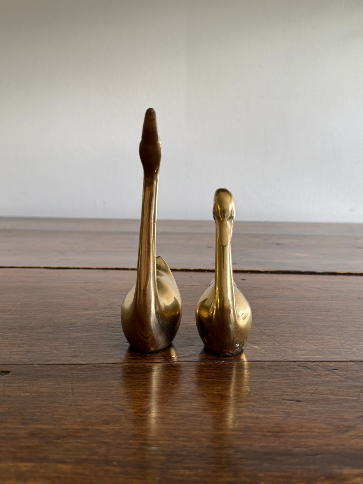 Set of Two Brass Swans with Black Base Detailing - Pair of Brass Birds