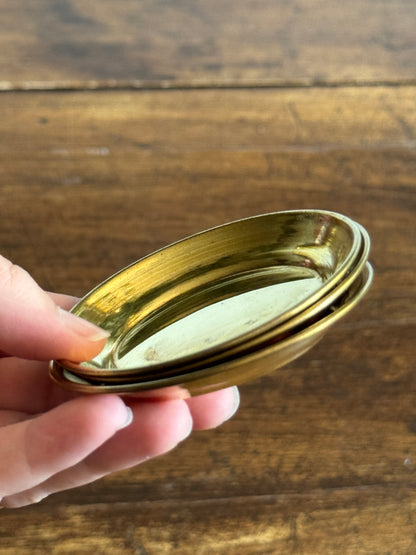 Three Small Brass Dishes with Simple Rolled Edge Design
