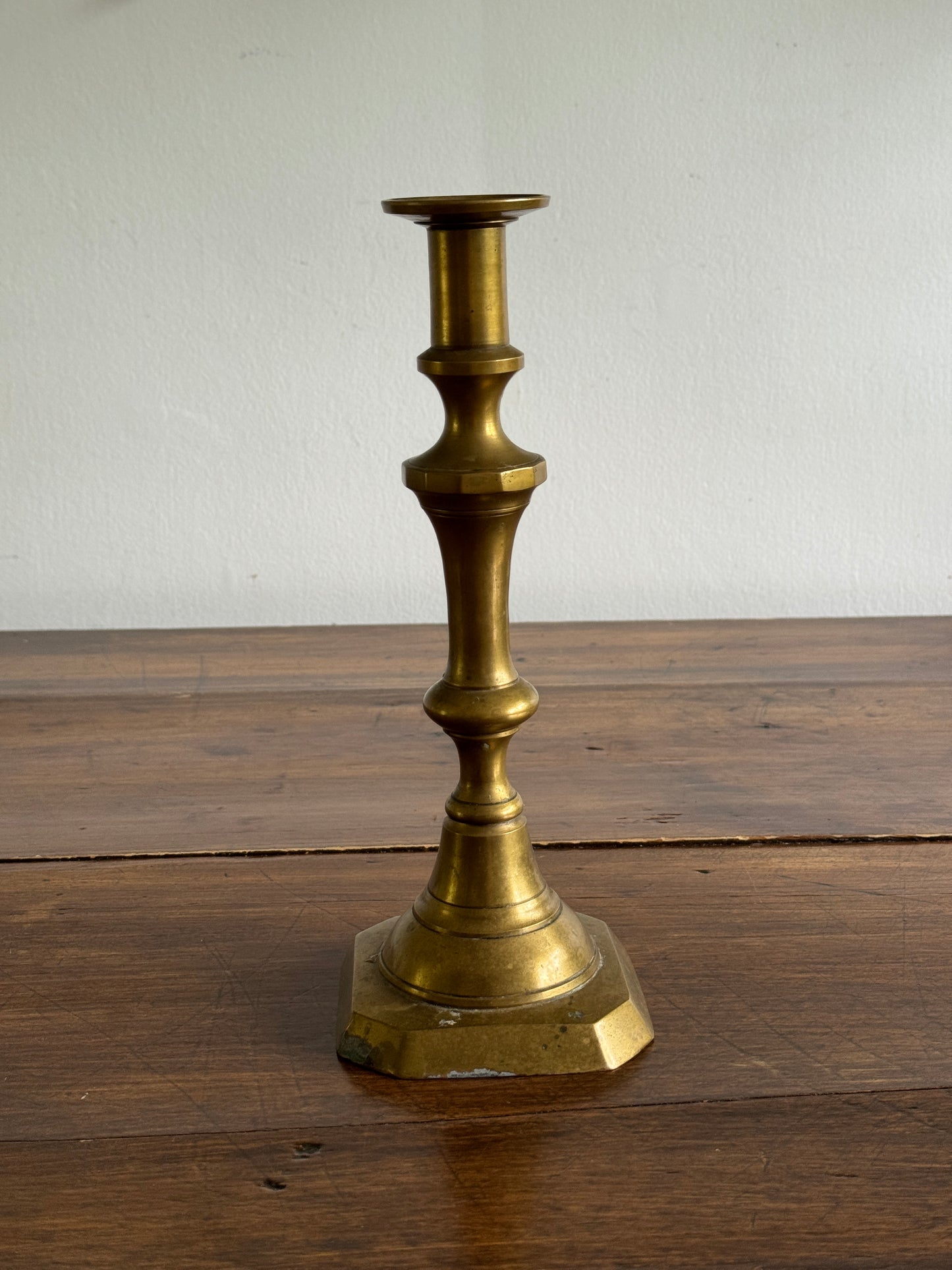 Single Large Brass Candlestick with Squared Base and Simple Fluted Post Detailing