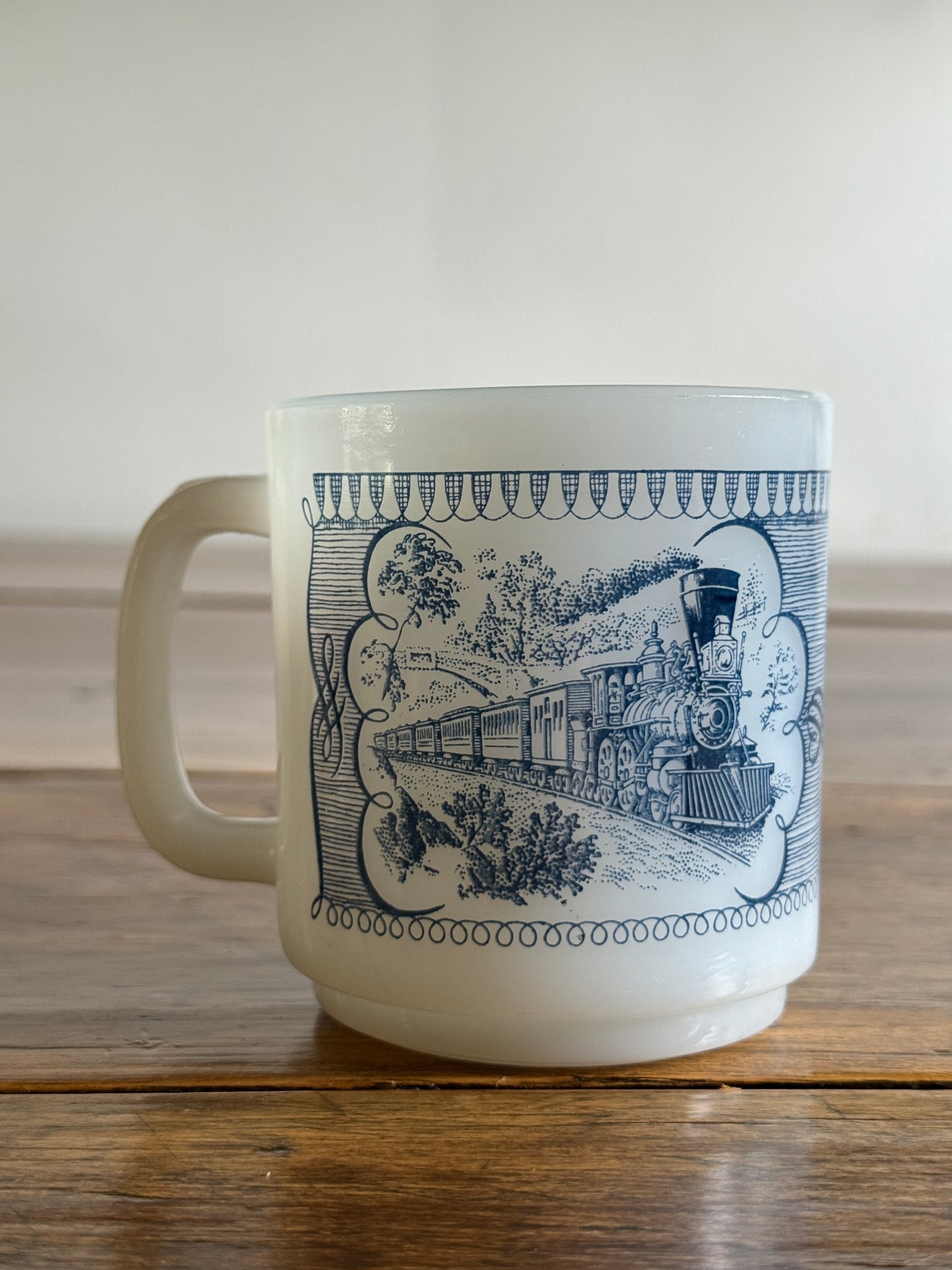 Vintage White Milk Glass Mug with Blue Vintage Train Design