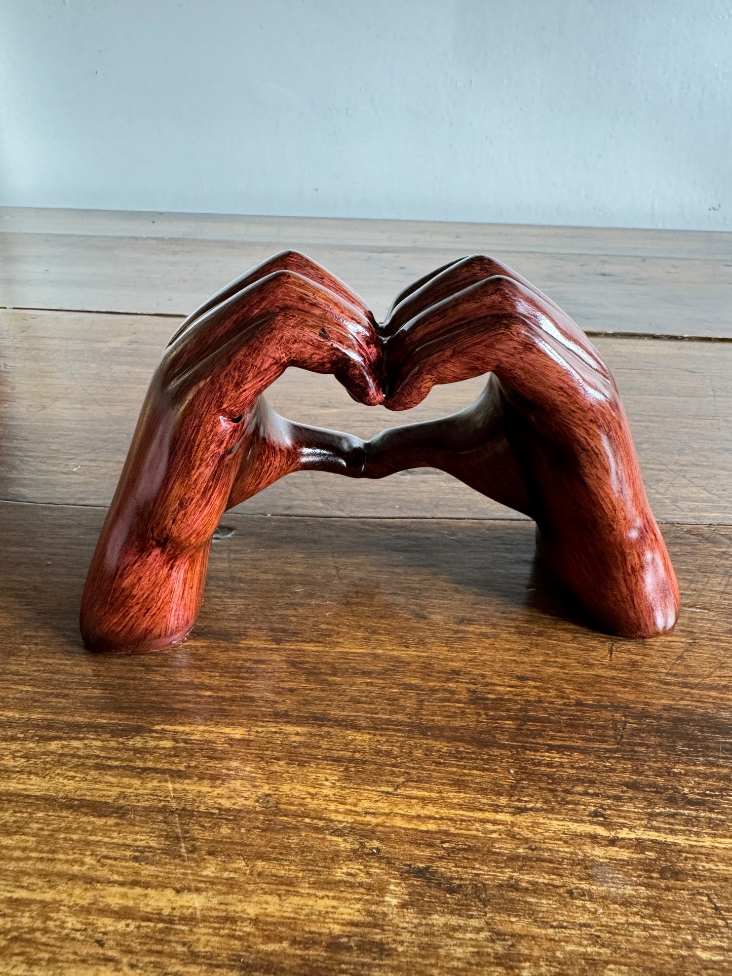 Ceramic Hands Making Heart Shape Figurine