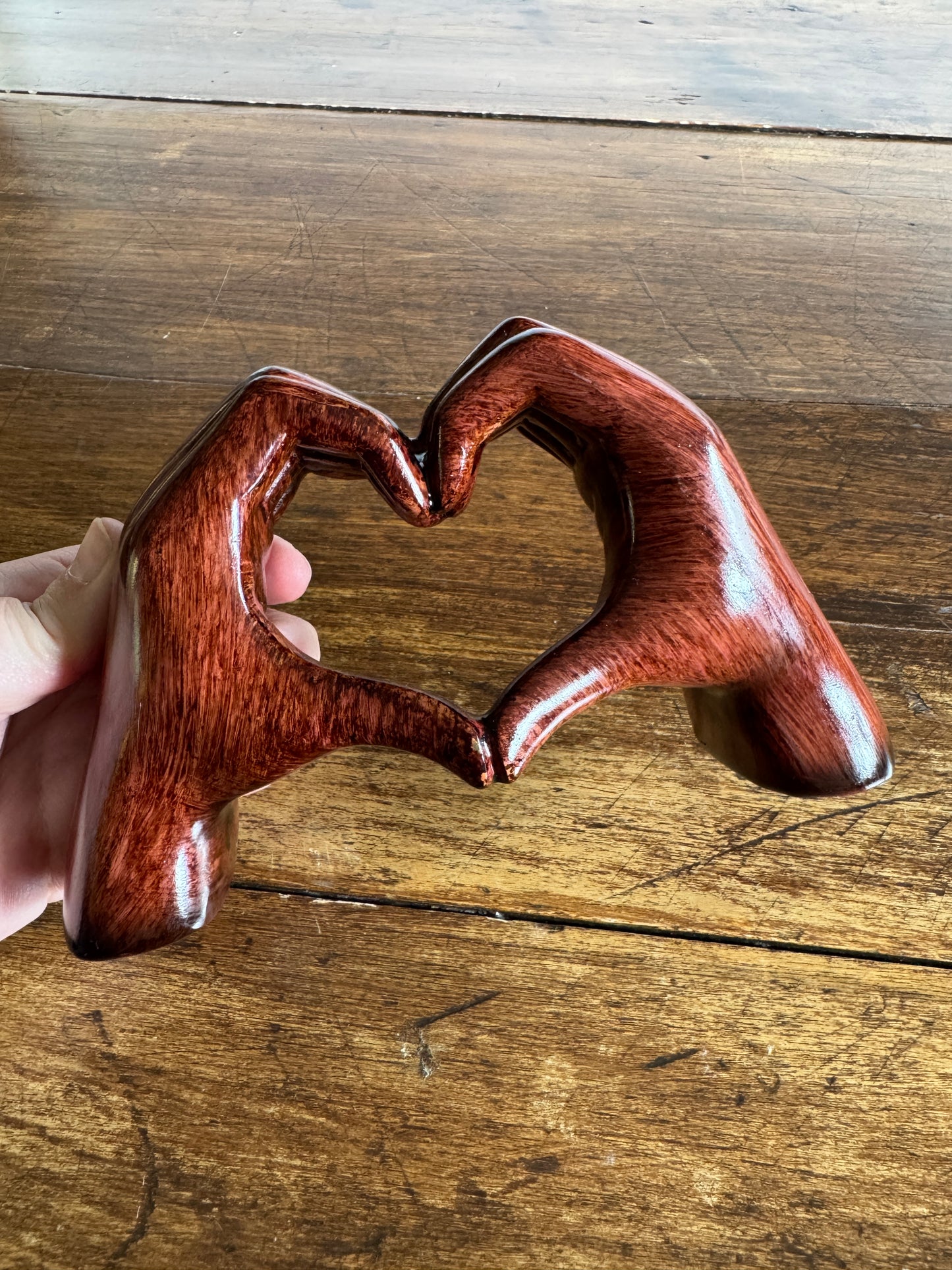 Ceramic Hands Making Heart Shape Figurine