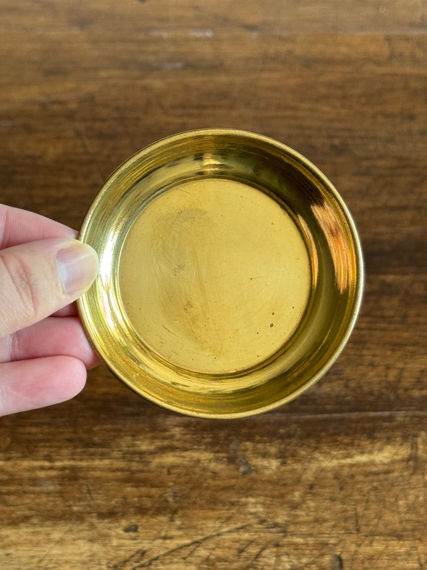 Three Small Brass Dishes with Simple Rolled Edge Design