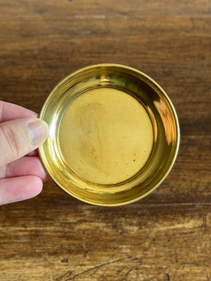 Three Small Brass Dishes with Simple Rolled Edge Design