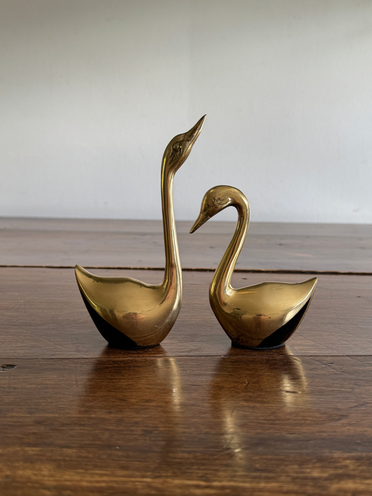 Set of Two Brass Swans with Black Base Detailing - Pair of Brass Birds