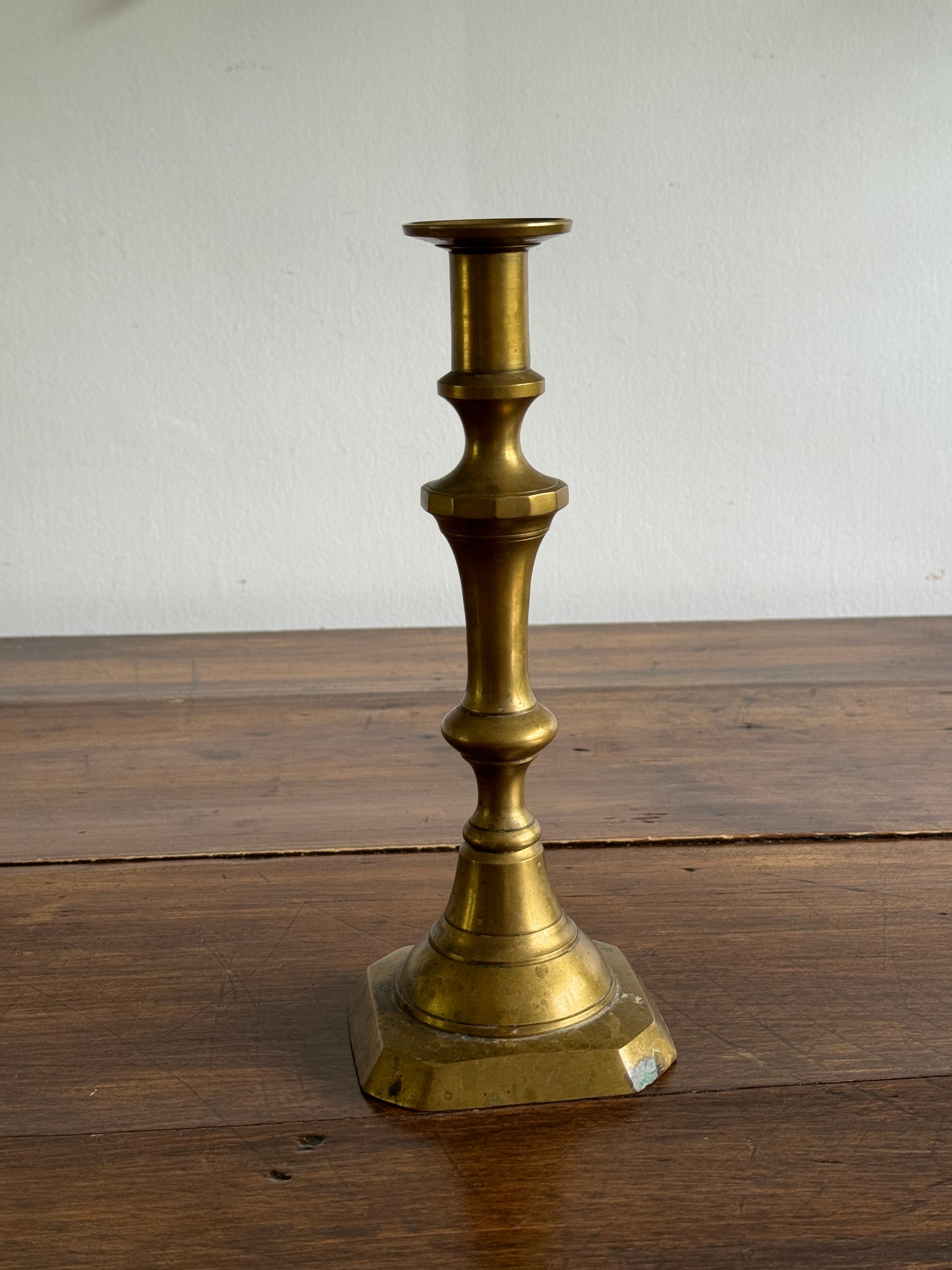 Single Large Brass Candlestick with Squared Base and Simple Fluted Post Detailing