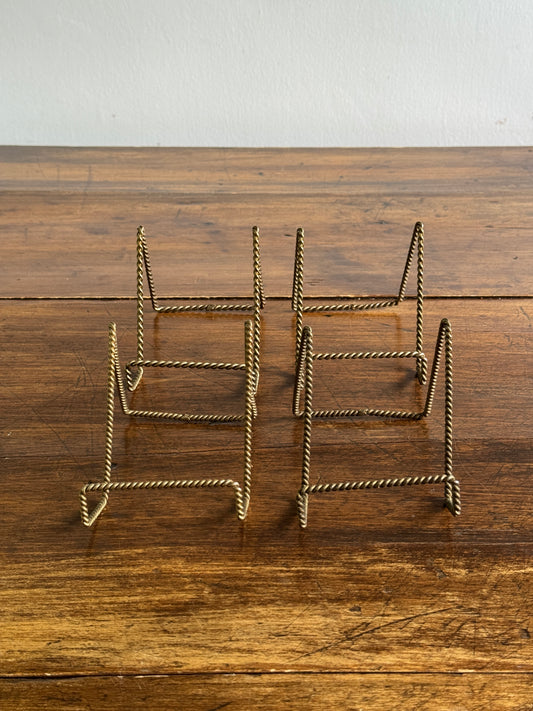 Set of Four Twisted Rope Brass Display Stands