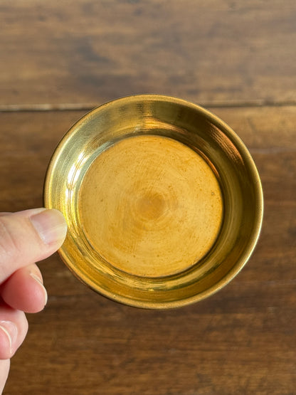 Three Small Brass Dishes with Simple Rolled Edge Design
