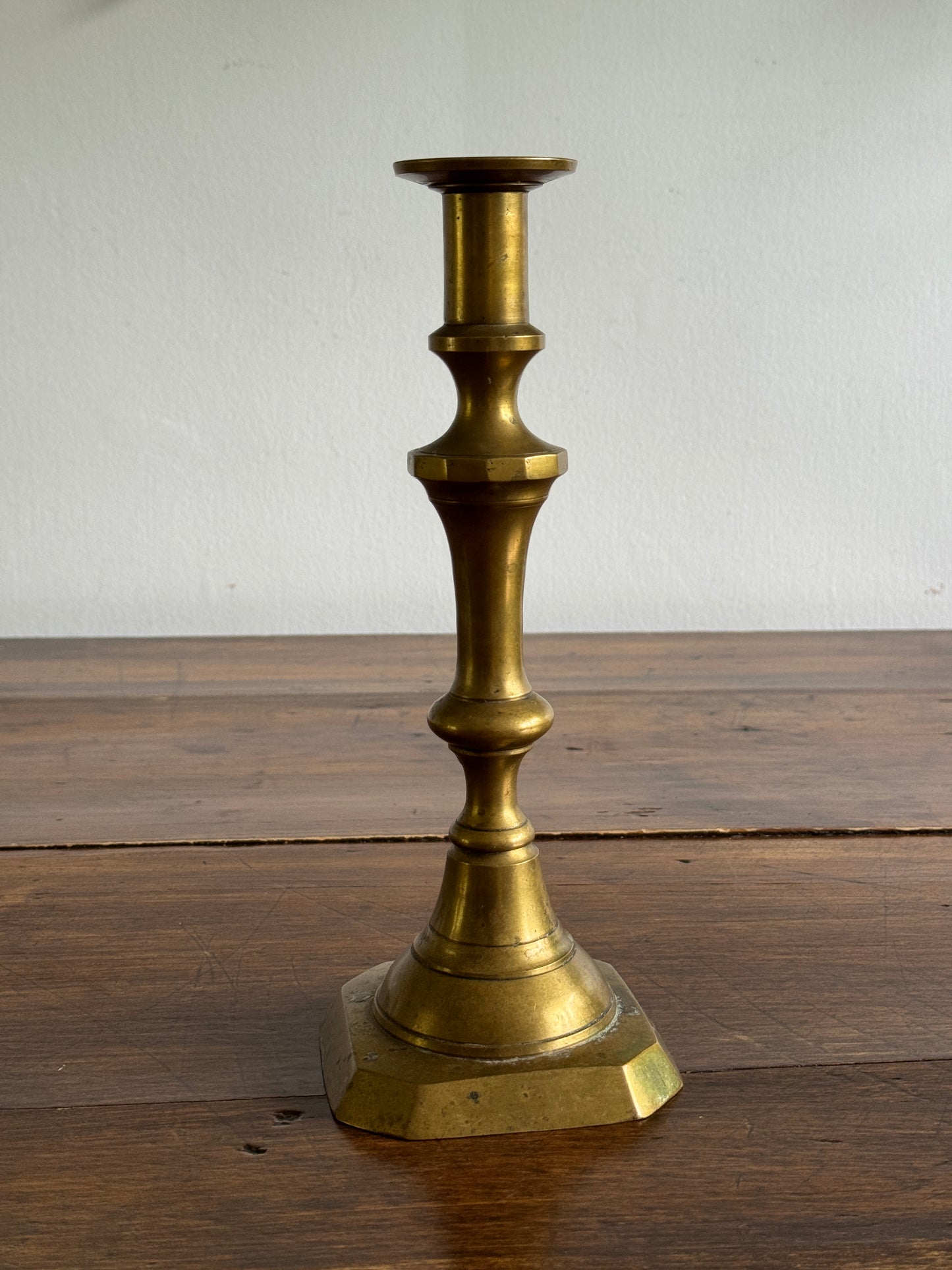 Single Large Brass Candlestick with Squared Base and Simple Fluted Post Detailing