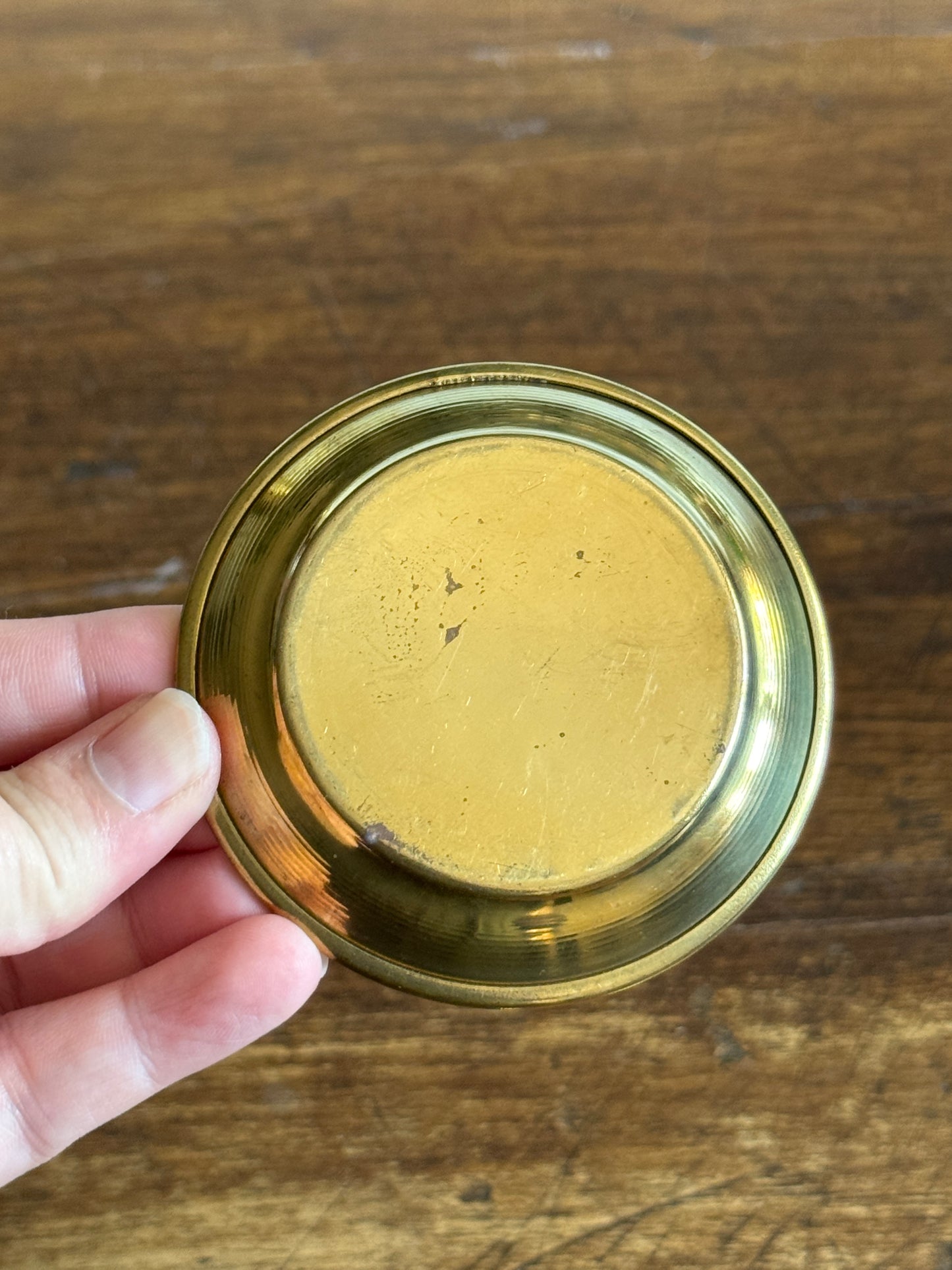 Three Small Brass Dishes with Simple Rolled Edge Design