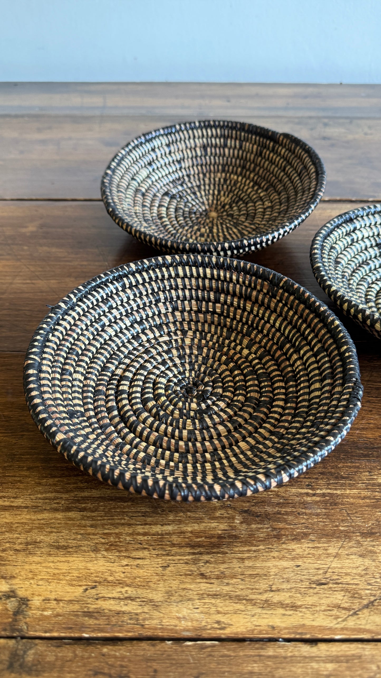 Set of Three Woven Sweet Grass Baskets with Black Accents