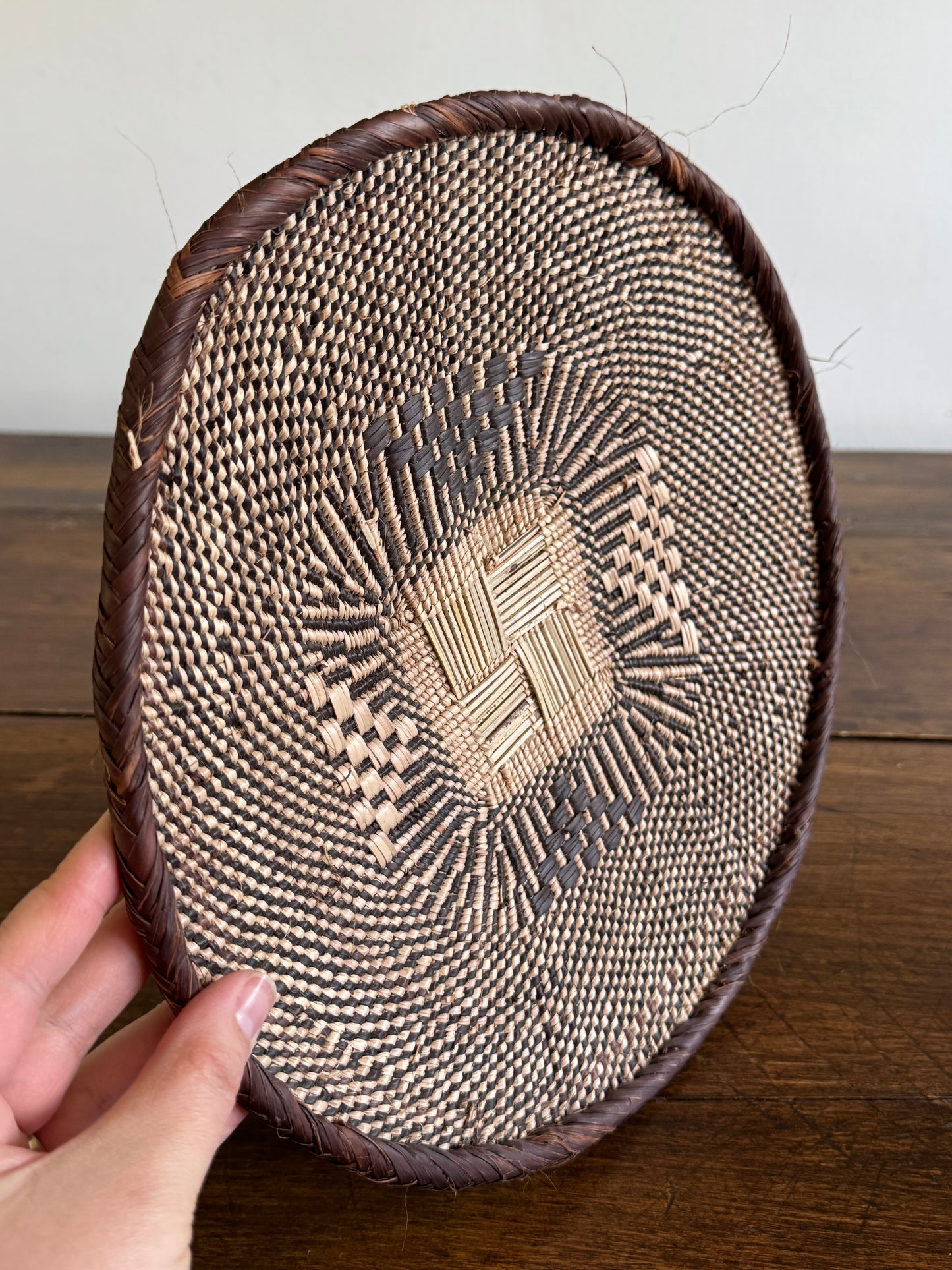 Vintage Woven African Flat Style Basket with Detailed Weaving Design