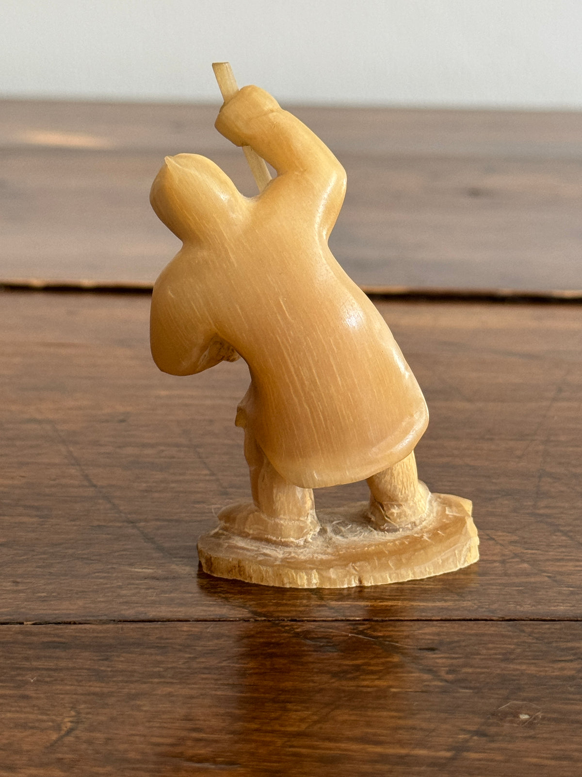 Vintage Canadian Horn Carved Seal Hunter Figurine