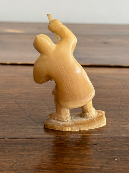 Vintage Canadian Horn Carved Seal Hunter Figurine