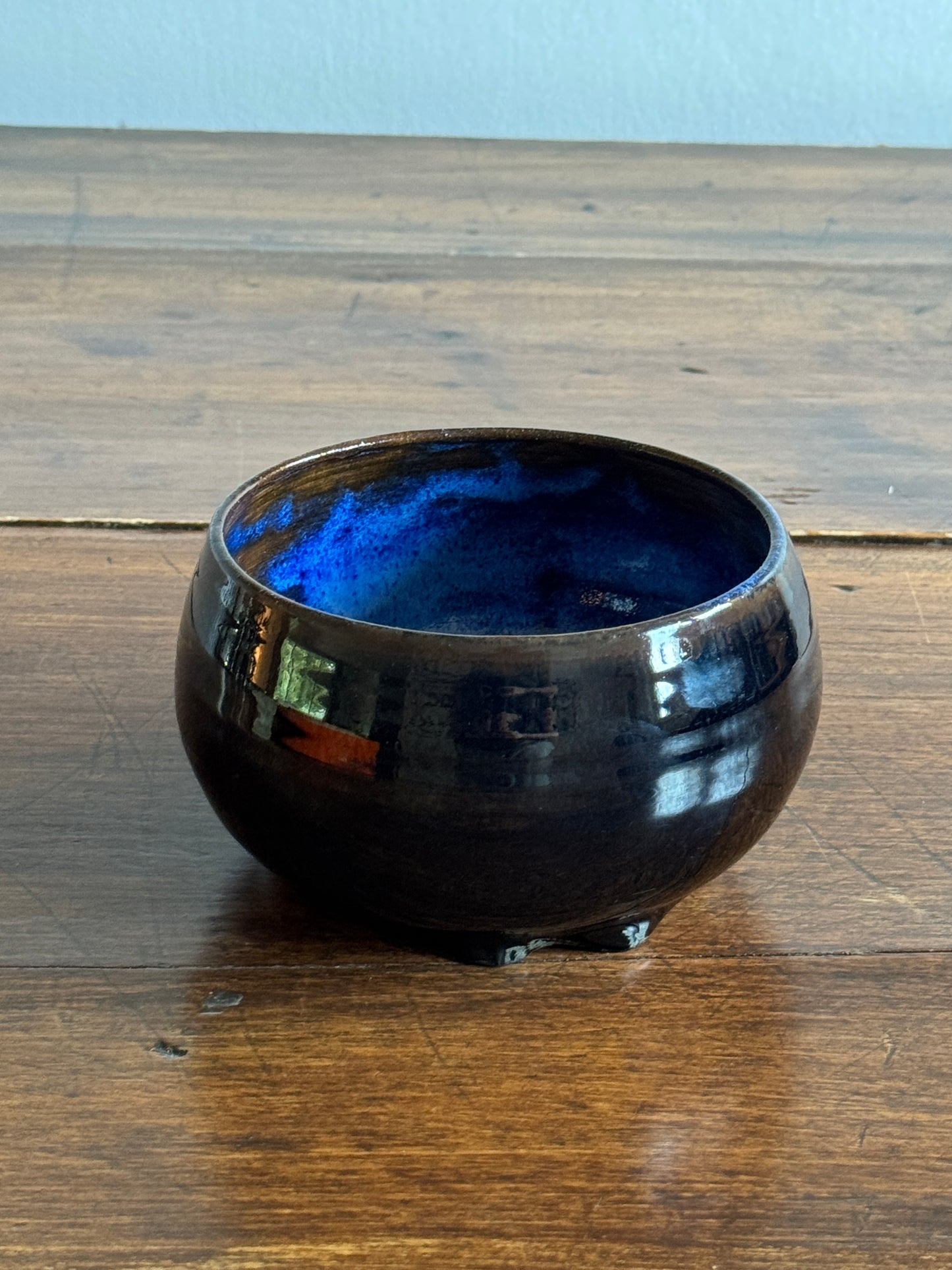 Deep Blue Pottery Bowl with Drip Glaze Feet