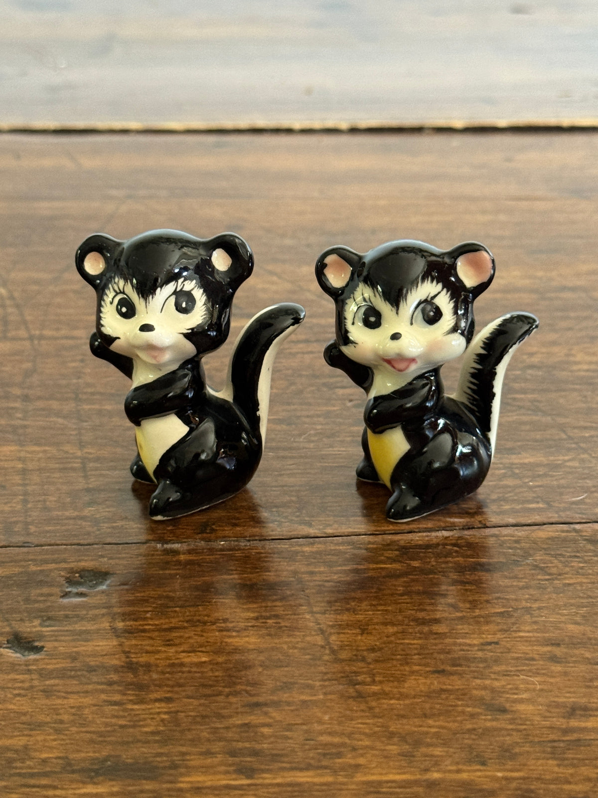 Pair of Vintage Cheery Skunk Figurines - Made in Japan