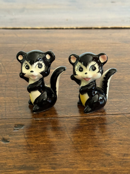 Pair of Vintage Cheery Skunk Figurines - Made in Japan