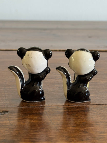 Pair of Vintage Cheery Skunk Figurines - Made in Japan